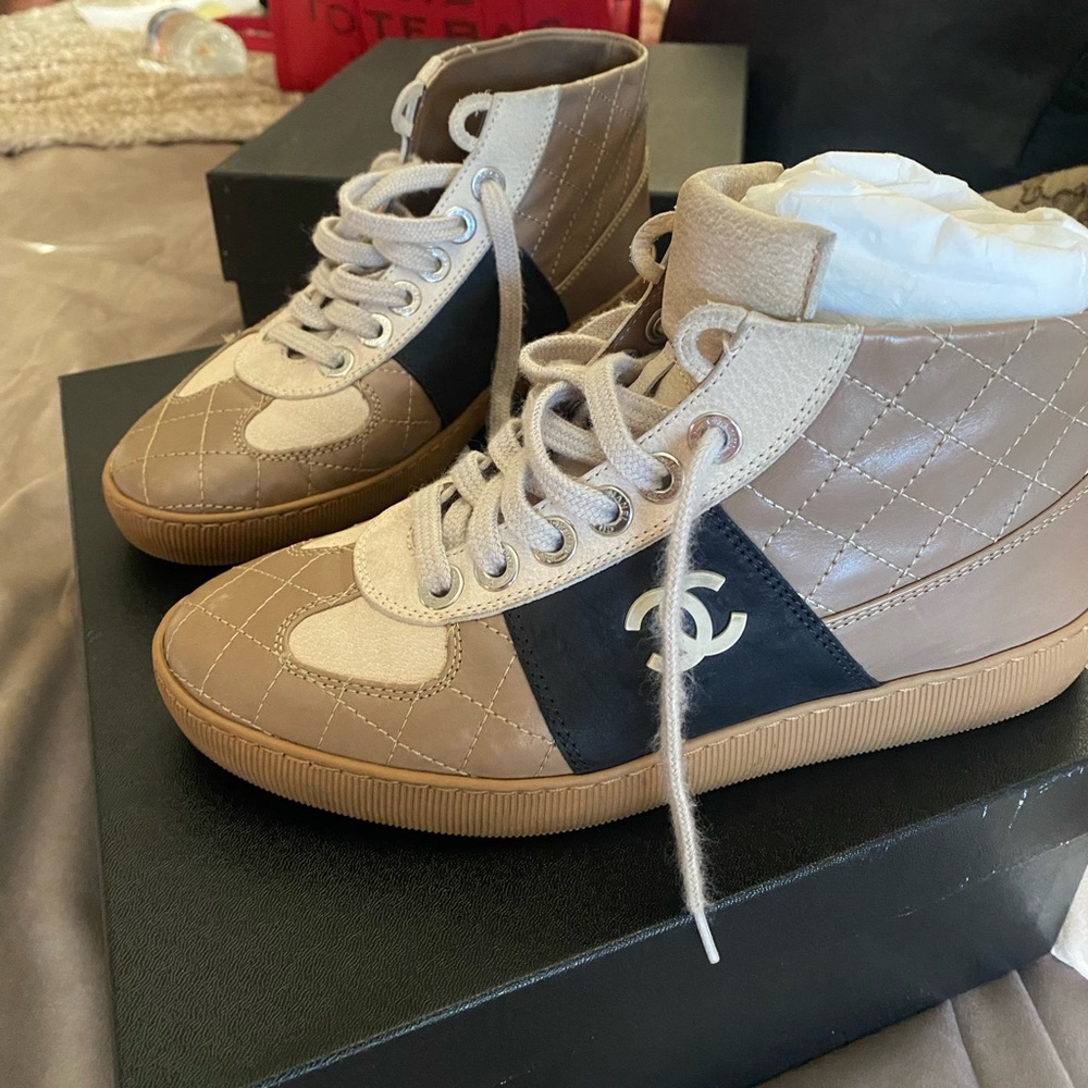 Chanel Vintage 1/4 high top leather quilted sneakers.